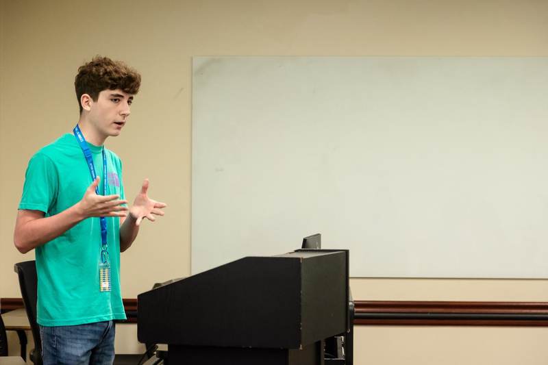 A speaker addressing an EBIT group.